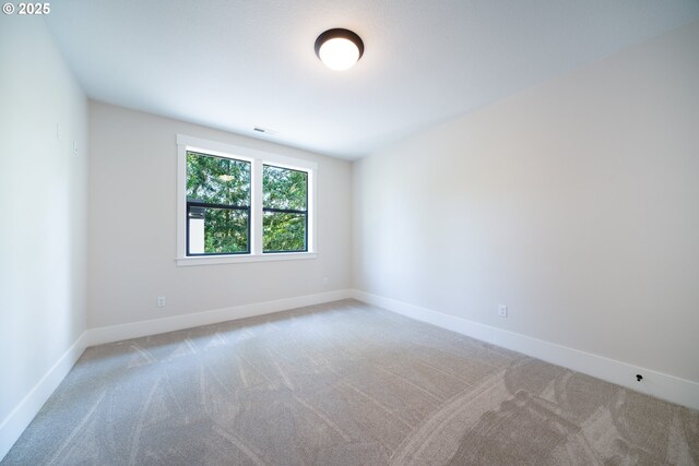 1931 13th St, West Linn, OR 97068 - spare room featuring carpet floors and baseboards