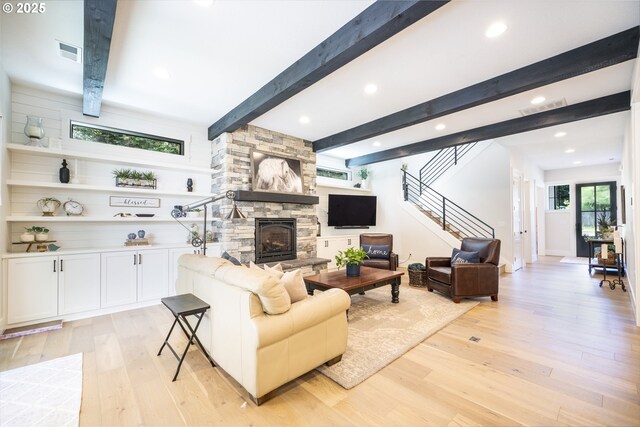 1931 13th St, West Linn, OR 97068 - living area with light wood-style flooring, beamed ceiling, a fireplace, stairs, and recessed lighting