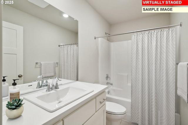 full bathroom featuring shower / bath combination with curtain, vanity, and toilet