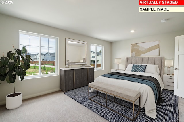 bedroom featuring light colored carpet