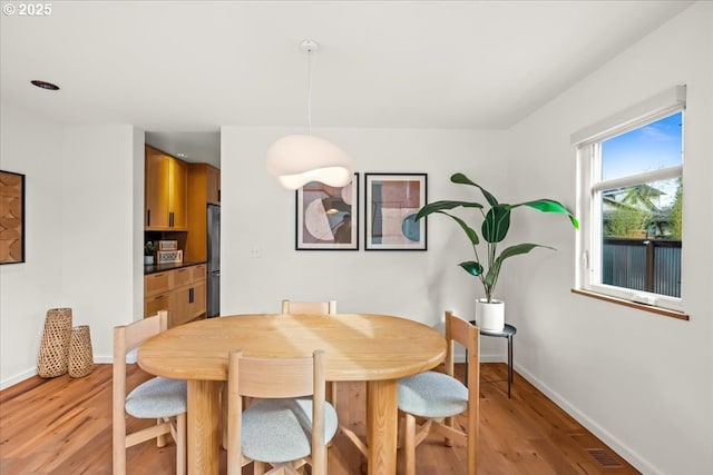 8316 SE 7th Ave, Portland, OR 97202 - dining space with light wood-type flooring and baseboards
