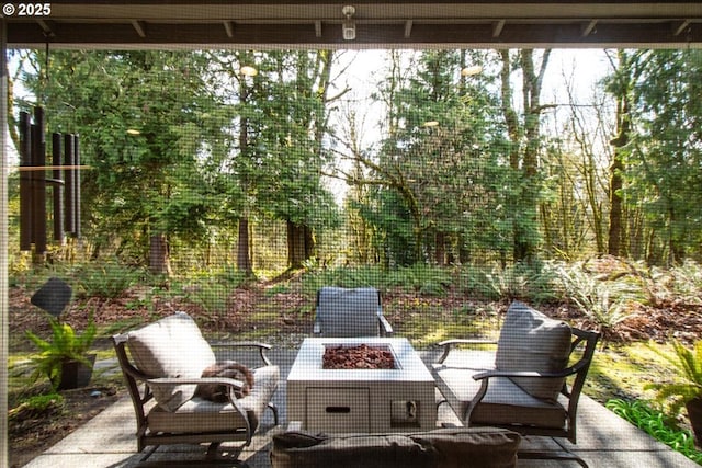 view of patio featuring an outdoor fire pit