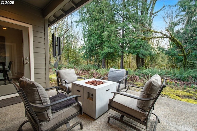 view of patio with a fire pit