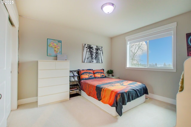 bedroom featuring carpet