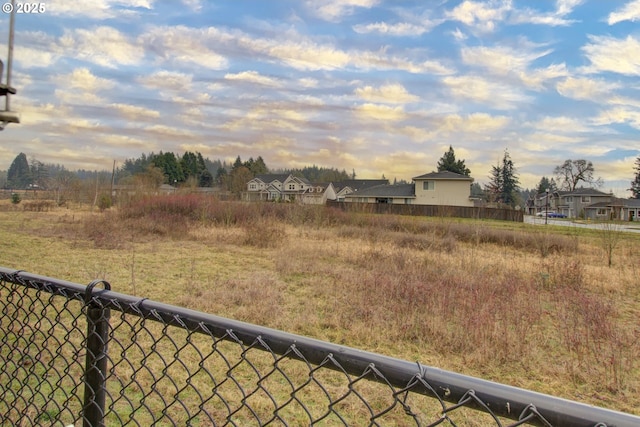 view of yard at dusk