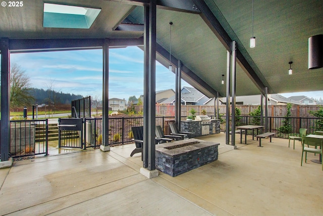 view of patio featuring an outdoor fire pit and area for grilling