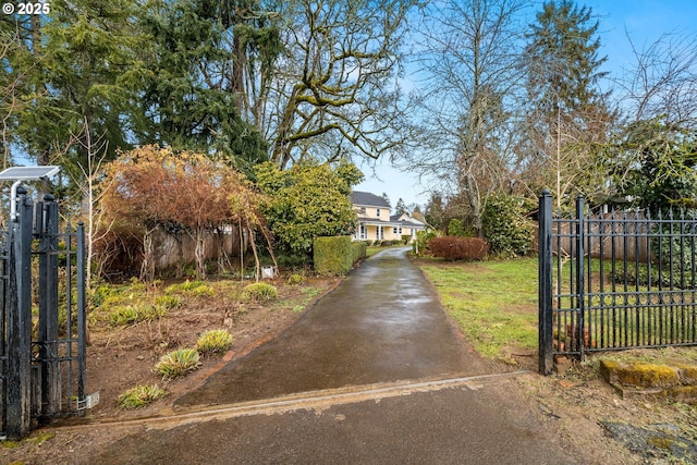 view of gate featuring fence