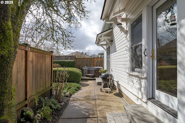 view of patio with fence