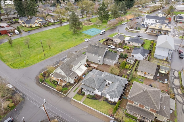 birds eye view of property with a residential view