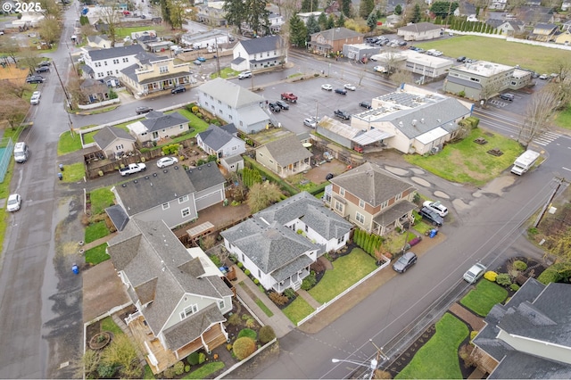 birds eye view of property with a residential view