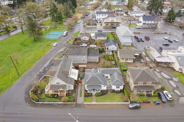 birds eye view of property with a residential view