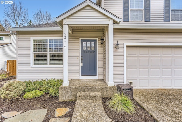 property entrance with a garage