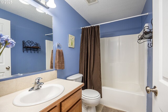 5761 Mt Vernon Rd, Springfield, OR 97478 - bathroom with toilet, vanity, a textured ceiling, and shower / bath combo