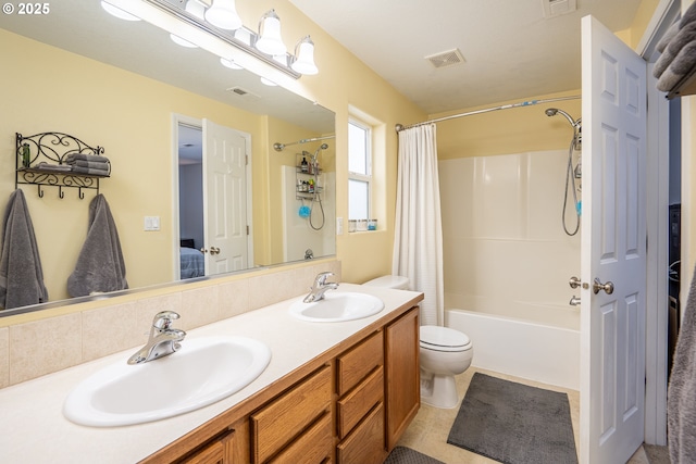5761 Mt Vernon Rd, Springfield, OR 97478 - ensuite bathroom with shower / bathtub combination with curtain, double vanity, tile patterned floors, and toilet