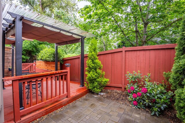 5761 Mt Vernon Rd, Springfield, OR 97478 - deck featuring a fenced backyard, a pergola, and a patio area