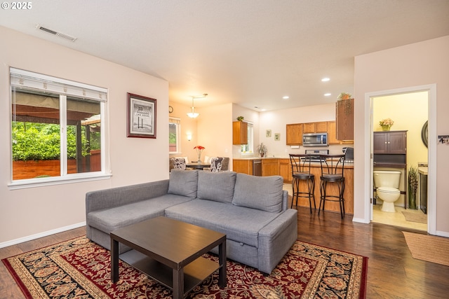5761 Mt Vernon Rd, Springfield, OR 97478 - living room with dark wood-style floors, recessed lighting, and baseboards