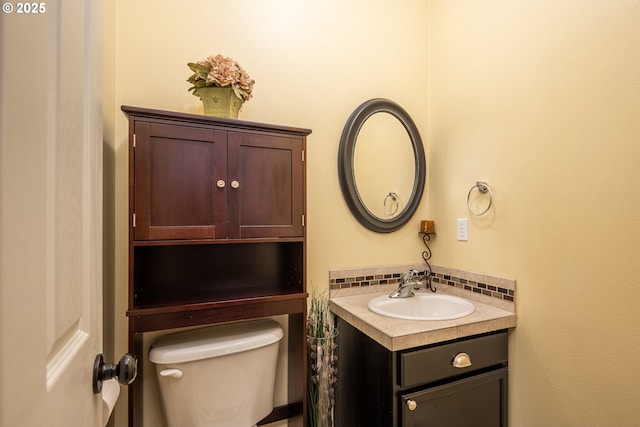 5761 Mt Vernon Rd, Springfield, OR 97478 - bathroom with vanity, tasteful backsplash, and toilet