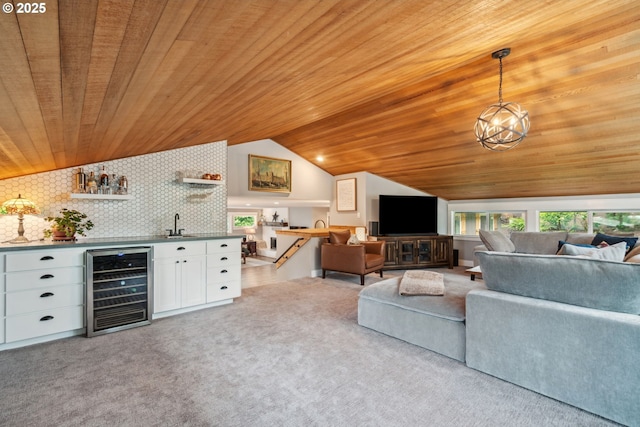 7780 Blinkhorn Way, Gladstone, OR 97027 - living area featuring wine cooler, wood ceiling, vaulted ceiling, bar with sink, and carpet