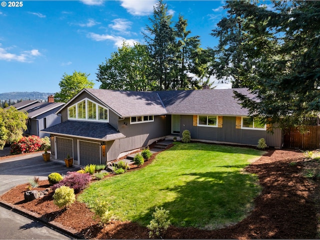 7780 Blinkhorn Way, Gladstone, OR 97027 - view of front of house featuring roof with shingles, an attached garage, asphalt driveway, and a front lawn