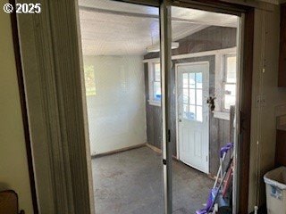 14031 SE Rhone St, Portland, OR 97236 - entryway featuring carpet floors and baseboards