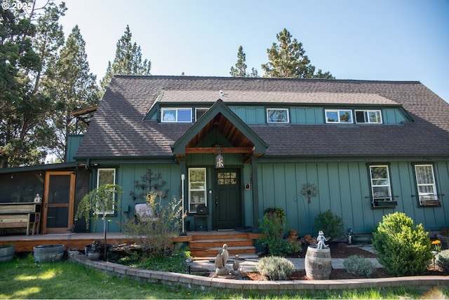 62725 Eagle Rd, Bend, OR 97701 - view of front of home with a sunroom and roof with shingles
