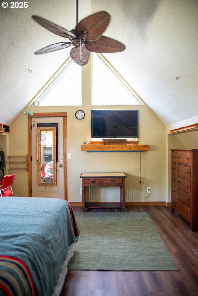 62725 Eagle Rd, Bend, OR 97701 - bedroom featuring baseboards, a textured ceiling, vaulted ceiling, and wood finished floors