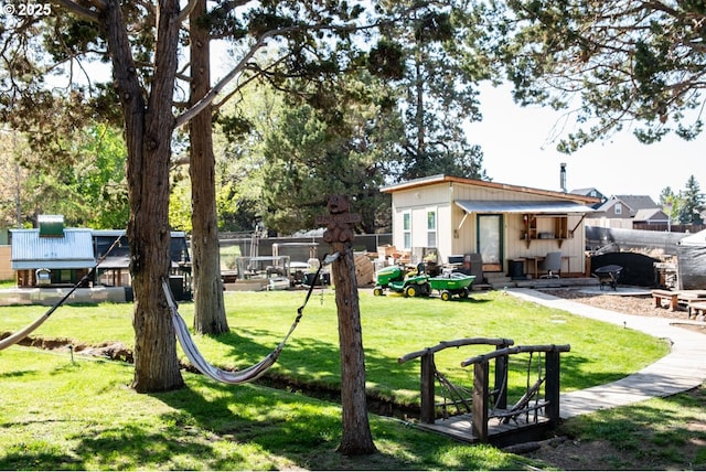 62725 Eagle Rd, Bend, OR 97701 - view of yard featuring an outdoor structure and fence