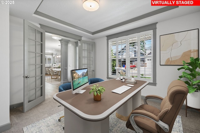 14716 Blue Blossom Way, Oregon City, OR 97045 - office featuring decorative columns, a tray ceiling, light carpet, and french doors