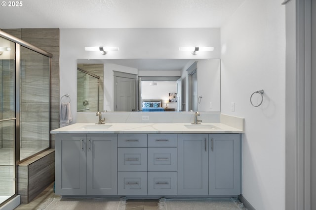 14716 Blue Blossom Way, Oregon City, OR 97045 - bathroom with double vanity, a stall shower, and ensuite bathroom