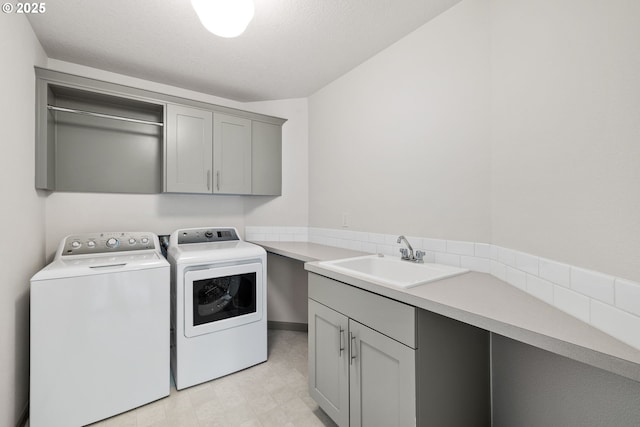 14716 Blue Blossom Way, Oregon City, OR 97045 - washroom with cabinet space and washer and clothes dryer