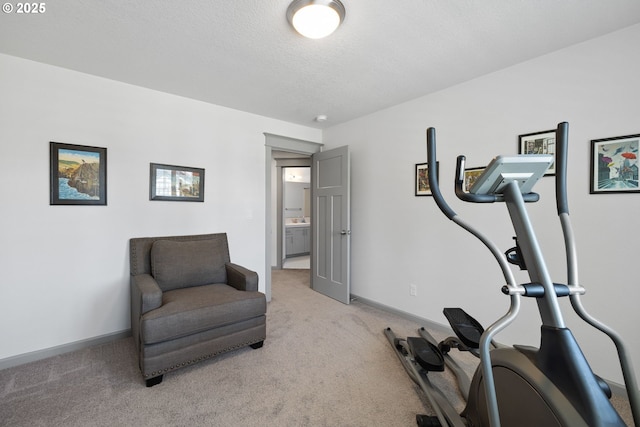 14716 Blue Blossom Way, Oregon City, OR 97045 - exercise room featuring light carpet, baseboards, and a textured ceiling
