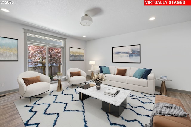 14716 Blue Blossom Way, Oregon City, OR 97045 - living room featuring wood finished floors and recessed lighting