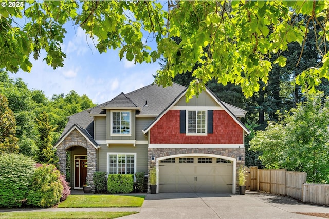 2121 Ostman Rd, West Linn, OR 97068 - view of front of property featuring stone siding, concrete driveway, a shingled roof, and board and batten siding