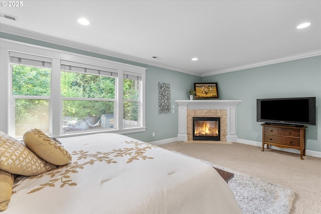 2121 Ostman Rd, West Linn, OR 97068 - carpeted bedroom with baseboards, multiple windows, a fireplace, ornamental molding, and recessed lighting