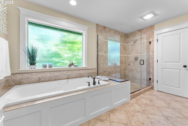 2121 Ostman Rd, West Linn, OR 97068 - bathroom with a shower stall, a garden tub, and tile patterned floors