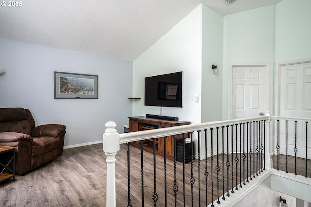 18576 SW Tara Meadows Ct, Beaverton, OR 97078 - living room featuring wood finished floors and high vaulted ceiling