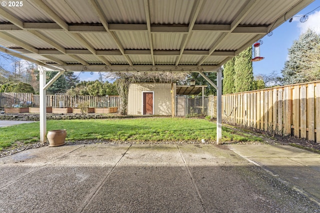 view of patio with a storage shed