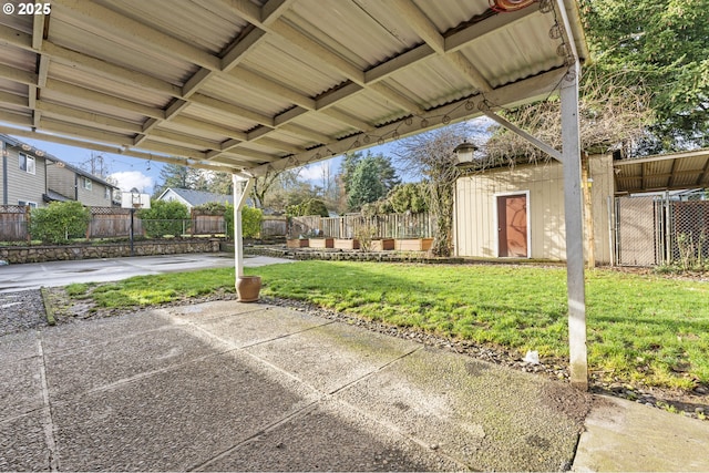 view of patio with a storage unit