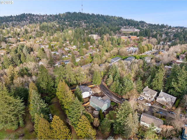 bird's eye view with a forest view