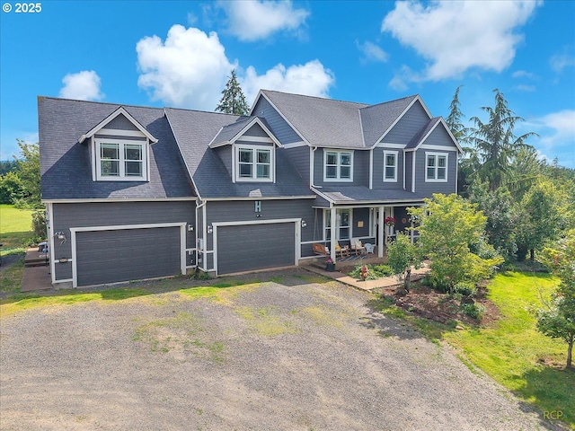 35412 SE Shade Tree Ln, Estacada, OR 97023 - view of front of house featuring covered porch, a garage, and driveway