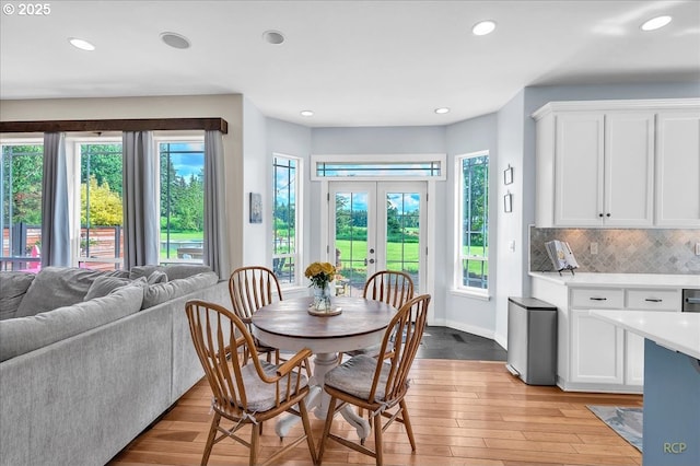 35412 SE Shade Tree Ln, Estacada, OR 97023 - dining room with french doors, recessed lighting, light wood-style flooring, and baseboards