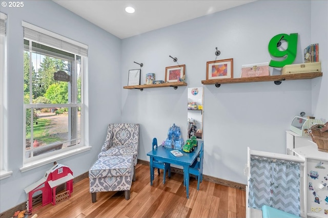 35412 SE Shade Tree Ln, Estacada, OR 97023 - sitting room with wood finished floors, baseboards, and recessed lighting