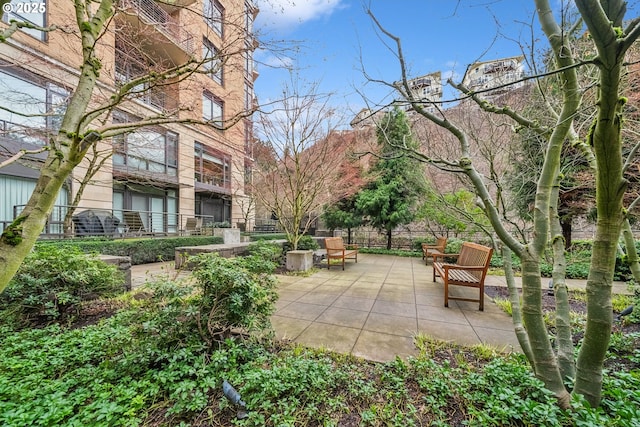 view of patio / terrace featuring fence