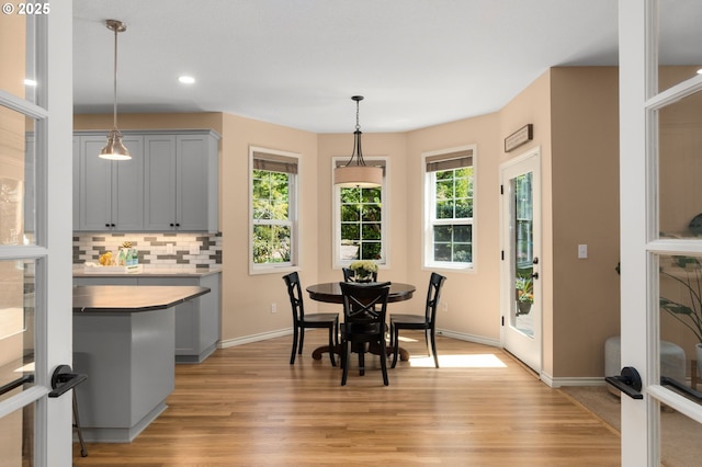 342 NW 84th Pl, Portland, OR 97229 - dining space with light wood-style flooring, recessed lighting, and baseboards