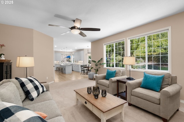 342 NW 84th Pl, Portland, OR 97229 - living area with a ceiling fan, light carpet, and recessed lighting