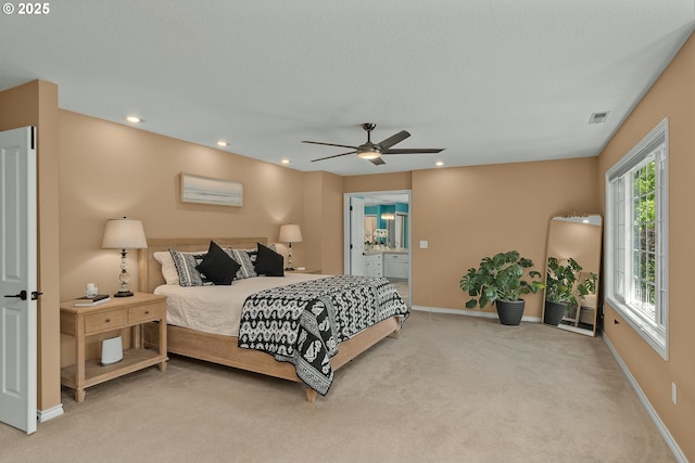342 NW 84th Pl, Portland, OR 97229 - bedroom with light carpet, baseboards, recessed lighting, ceiling fan, and connected bathroom