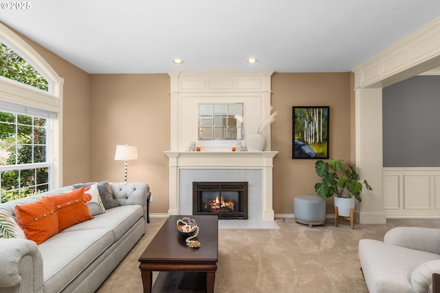 342 NW 84th Pl, Portland, OR 97229 - carpeted living area featuring a fireplace and recessed lighting