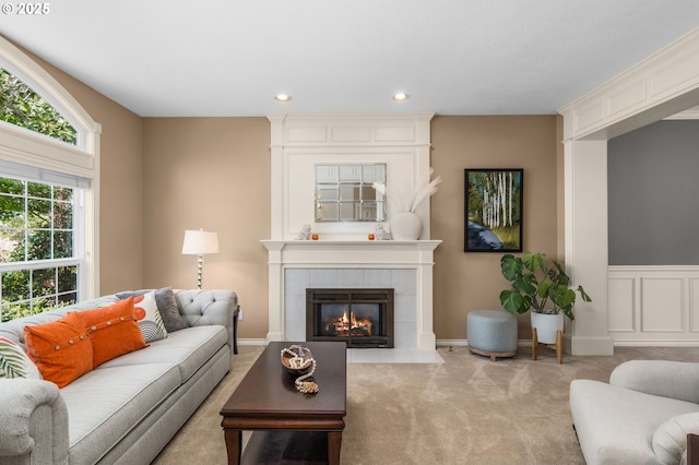 342 NW 84th Pl, Portland, OR 97229 - living room featuring a fireplace, carpet floors, and recessed lighting