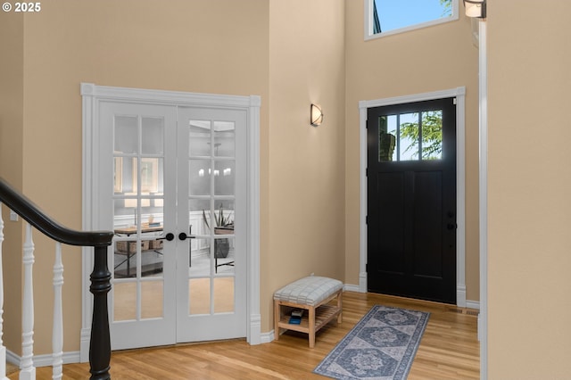 342 NW 84th Pl, Portland, OR 97229 - entrance foyer with wood finished floors, a high ceiling, french doors, and baseboards