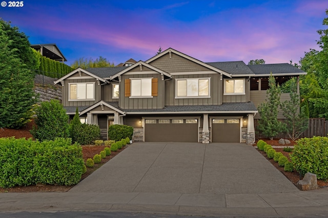 5309 NW 13th Cir, Camas, WA 98607 - craftsman house featuring a garage, board and batten siding, driveway, and stone siding
